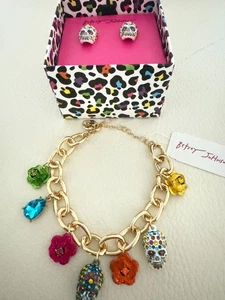 Betsey Johnson Gold Tone Skull Charm Bracelet and earrings set Halloween - Picture 1 of 7