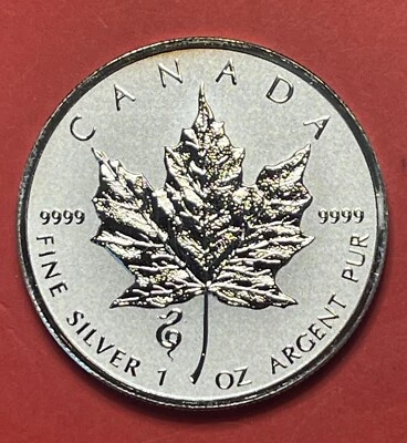 Canadá 2013 $5 hoja de arce de plata, gema, 1 OZ .9999 fino, privado de serpiente. Foto 1 de 2
