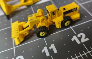 1997 Hot Wheels Planet Micro CAT MACHINES Series 1 Mattel Caterpillar Yellow Car - Picture 1 of 1