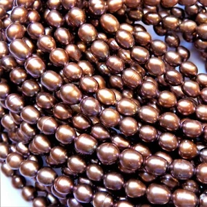 4 cuentas de arroz con perlas cultivadas de agua dulce marrón claro de 6 mm 55 cuentas - Imagen 1 de 4