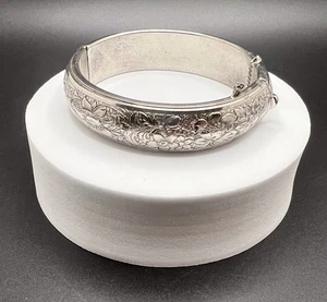 Vintage Silver Tone Floral Embossed Hinged Bangle Bracelet 5/8” Wide - Picture 1 of 5