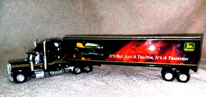 SPEC CAST/LIBERTY CLASSIC PETERBILT 379 TRACTOR JOHN DEERE TRAILER 1/64 NIB - Picture 1 of 9