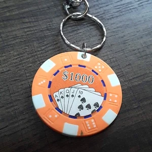 Llavero naranja con fichas de póker de $1000  - Imagen 1 de 5