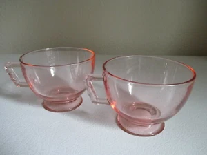 Vintage Set of 2 PINK DEPRESSION FOOTED CUPS with textured handles - Picture 1 of 3