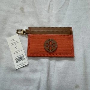 Nuovo portafoglio compatto TORY BURCH Immerso Slim Card Case arancione schiacciato e marrone chiaro 39111 - Foto 1 di 7