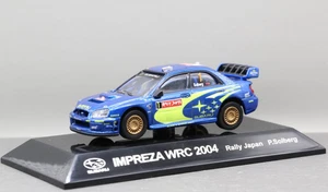 Coche de Rally CM 1/64 SS.1 Subaru Impreza STI WRC 2004 Japón Petter Solberg No.1 - Imagen 1 de 5
