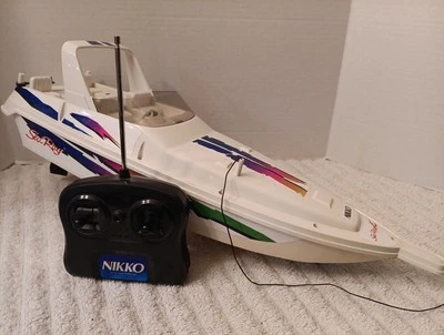 Nikko Vintage R/C BARCO DE CARRERAS Sea Ray 20" X 6" de largo para PIEZAS/REPARACIÓN con REMOTO Foto 1 de 4