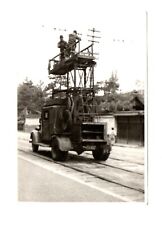 Photo ASIAN LINEMAN repairs ELECTRIC TROLLEY LINE in industrial lift truck 1947