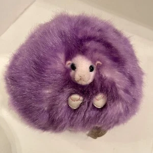 Peluche de lavanda pequeña púrpura con cara y orejas rosadas, ¡también ronronea! - Imagen 1 de 11