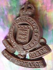 Royal Army Ordnance Corps Plastic Economy Cap Badge KC MMMG marked