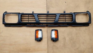 fits Nissan 720 Navara Hardbody D21 Pickup 93-97 Grille Corner Lamp Matte Black - Picture 1 of 4