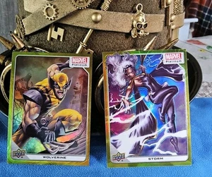 2023 Upper Deck Marvel Platinum / Yellow Rainbow / Both Storm 65 & Wolverine 87 - Bild 1 von 3
