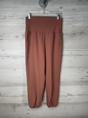 Pantalones de chándal Vanilla Star para mujer rosa medio tiro alto bolsillos elásticos en puños Foto 1 de 4