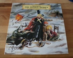 ORIGINAL Autogramme von Die Toten Hosen. Auf VINYL 12". AUF DEM KREUZZUG INS..." - Bild 1 von 1