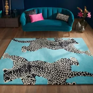 Zwei kletternde Leoparden auf blauer Oberfläche moderne handgefertigte getuftete Vorleger. - Bild 1 von 5