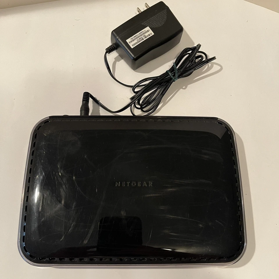 Netgear Universal Dual Band Wifi Range Extender 4 Port Wifi Adapter WN2500RP - Image 1 of 4