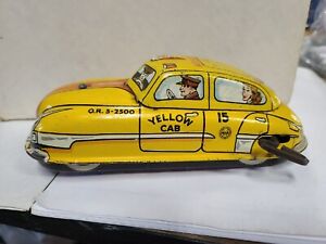 VINTAGE WINDUP MARX YELLOW CAB TIN MECHANICAL TOY CAR WORKS TAXI LM-52