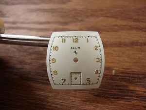 NOS VINTAGEELGIN TONNENFORM ZIFFERBLATT - ORIGINAL - SCHWER ZU FINDEN - KOSTENLOSER VERSAND - SCHÖN!!!!!!! - Bild 1 von 4