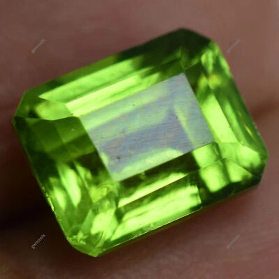 NATURAL PERIDOT Green 9.20 Carat Emerald Shape CERTIFIED Rare Loose Gemstone - Image 1 of 4