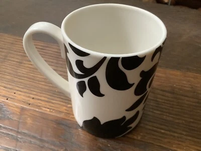 Martha Stewart Collection Black And White Floral 4 1/8 “ High 3 2/8”dia - Image 1 of 3