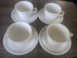 TAZA Y PLATILLO CORELLE COPO DE NIEVE AZUL 4 DE CADA 8 PIEZAS EN TOTAL ENVÍO GRATUITO EE. UU. - Imagen 1 de 6