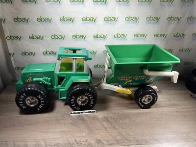 Vintage 1996 NYLINT Farms Metal / Plastic Green Tractor w/ Grain Hauler Trailer - Image 1 of 4