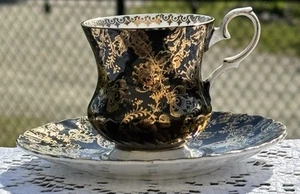 Elizabethan Sovereign Gold Floral & Leaves On Black Footed Cup & Saucer Set - Picture 1 of 16