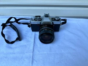 Minolta XG-9 + Objektiv 9840399 Soligor Zoom Macro 28 - 50 mm - Bild 1 von 12