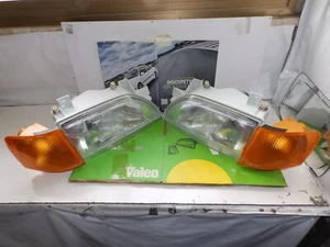 FORD ESCORT MK4 DEL 91 - FARI DX E SX COMPLETI DI FANALINI ANTERIORI ARANCIO - Foto 1 di 4