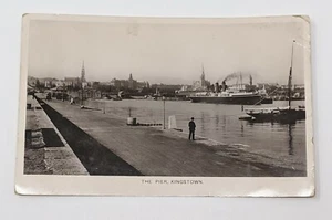 RPPC The Pier, Kingstown UK Man On Dock, Steamship and Sailboat 1912 Real Photo - Picture 1 of 2