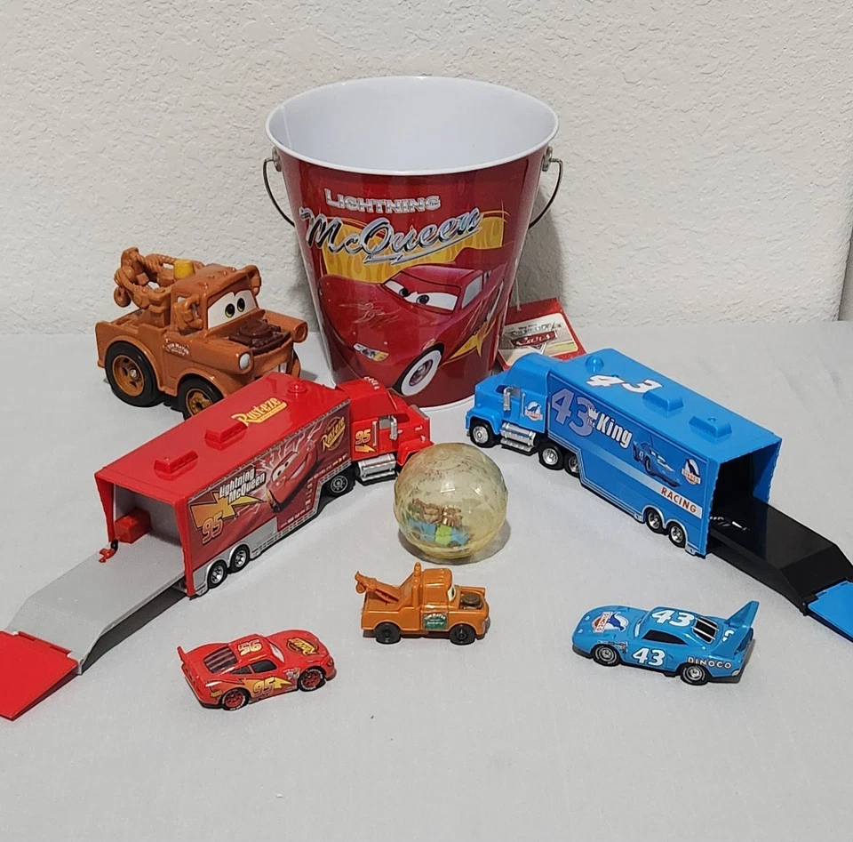 Lot of 8 Disney Pixar Cars Items Dinoco Mack McQueen Tow Mater (talks) and Pail - Image 1 of 4