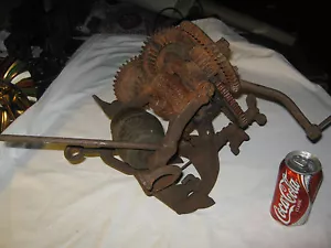 ANTIQUE McCORMICK DEERING TRACTOR USA CAST IRON GEAR WHEEL SHARPENING STONE TOOL - Picture 1 of 8