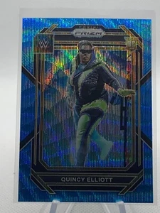 2023 Panini Prizm WWE Prizms Blue Wave #104 Quincy Elliott - Picture 1 of 2