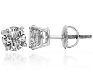 ORECCHINI A PERNO CON DIAMANTI TAGLIO TONDO 0,65 CT D SI1 ORO BIANCO 14K - Foto 1 di 1