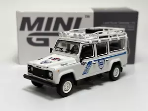 Land Rover Defender 110 1991 Safari Martini Supporto LHD 1:64 Mini GT MGT00558L - Foto 1 di 7