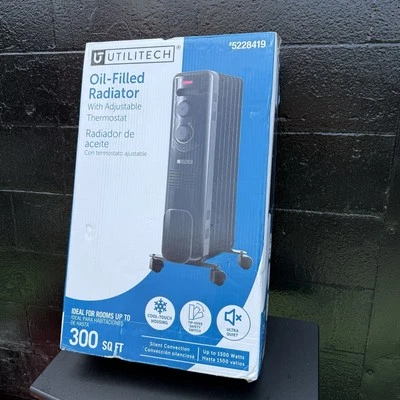Utilitech 1500 -Watt Oil-filled radiant Utility Indoor Electric Space Heater - Image 1 of 4