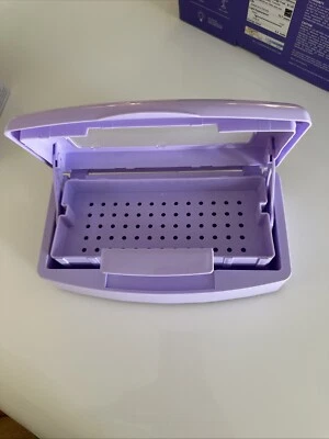 Caja esterilizadora de herramientas para uñas, bandeja de esterilización de plástico para pinzas. Foto 1 de 2