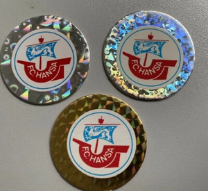 3x Hansa Rostock POG Cap Vereinslogo Silber Gold Bundesliga Fußball Schmidt - Bild 1 von 2