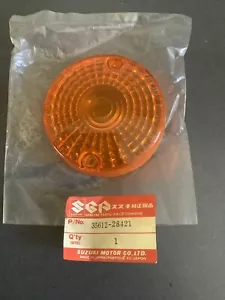 Suzuki NOS 79 GT 250, TS125, 80-81 DR 400S Turn Signal Lens 35612-28421 - Picture 1 of 3