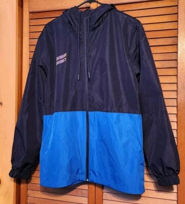 Chaqueta cortavientos Hurley para hombre mediana bloques de colores negra y azul cremallera completa al aire libre Foto 1 de 4
