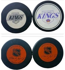 LOT 2 LOS ANGELES KINGS JOHN A. ZIEGLER GAME PUCK NHL TRENCH GENERAL TIRE SLUG