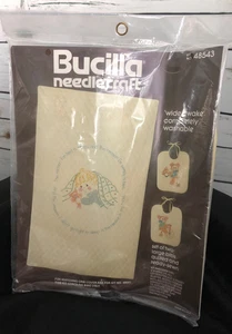 Bucilla Needlecraft 2 baby bibs yellow “Wide Awake” 48543 new unopened package - Picture 1 of 9