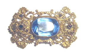 ENCANTADOR PIN DE FLOR ADORNADA AZUL Y GRANATE VICTORIANO antiguo tono dorado azul y granate - Imagen 1 de 3
