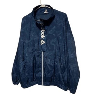 Chaqueta deportiva Reebok 2XL para mujer forrada de malla estampada Focus con bolsillos delanteros Foto 1 de 4