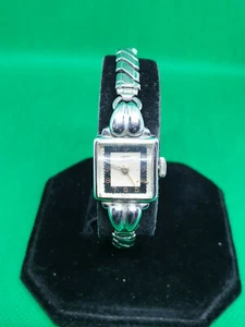 Reloj de vestir vintage contextual tono plateado, pulsera en expansión, hecho en Suiza.#bv. - Imagen 1 de 7