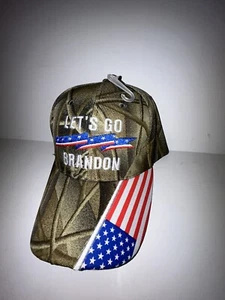 HAT / LET’S GO BRANDON (WOODLAND HAT) - ADJUSTABLE STRAP / ONE SIZE FITS ALL - Picture 1 of 14