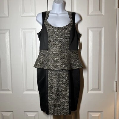 Vestido XOXO Starlight Peplum Talla 11/12 Sin Mangas Negro Dorado Acentos Metálicos Foto 1 de 4