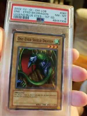 Yugioh One-Eyed Shield Dragon LOB-087 New 1st Ed NEW PSA 8 NM/MINT HTF Very Rare - Image 1 of 4