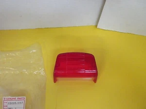 N.O.S OEM Kawasaki Vulcan 1500 '88 ZN700A LTD tail light lens #23026-1057 - Picture 1 of 6