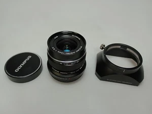 Olympus M.Zuiko Digital ED 12mm F/2 ED Black + LH-48 Lens Hood - Picture 1 of 2